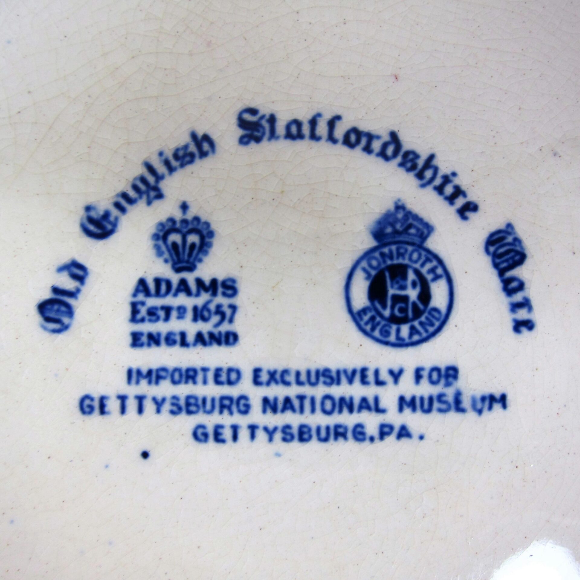 Markings on the Gettysburg Souvenir Plate Depicting Gettysburg National Museum read: "Old English Staffordshire Ware. ADAMS Est. 1657 ENGLAND. JONROTH ENGLAND. Imported exclusively for Gettysburg National Museum, Gettysburg, PA.