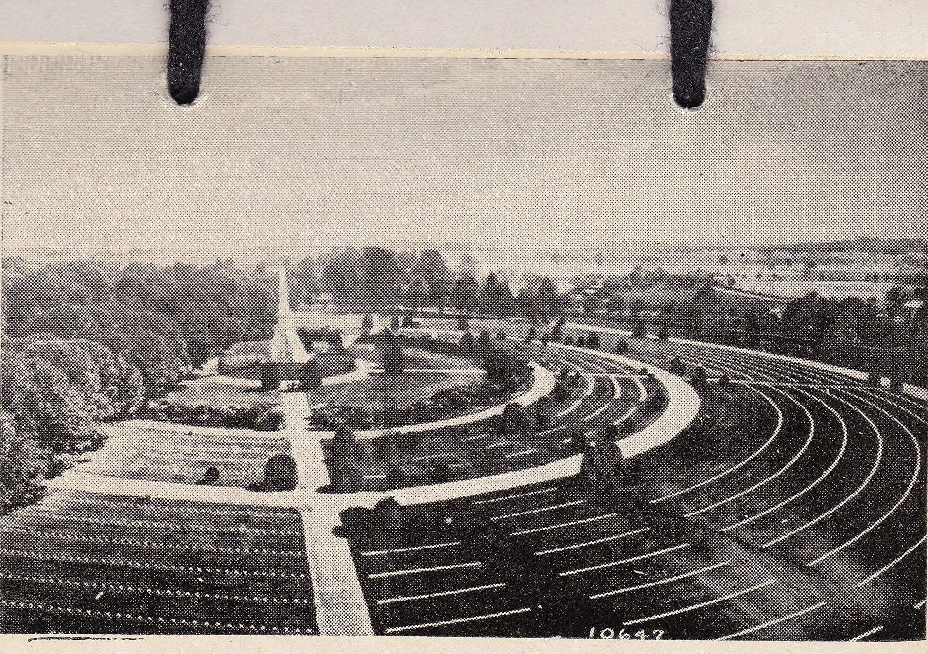 Black and white photo from "Gettysburg Souvenir Views of the Battlefield" shows a large semicircular outdoor amphitheater with multiple seating rows, surrounded by trees and landscaped pathways.