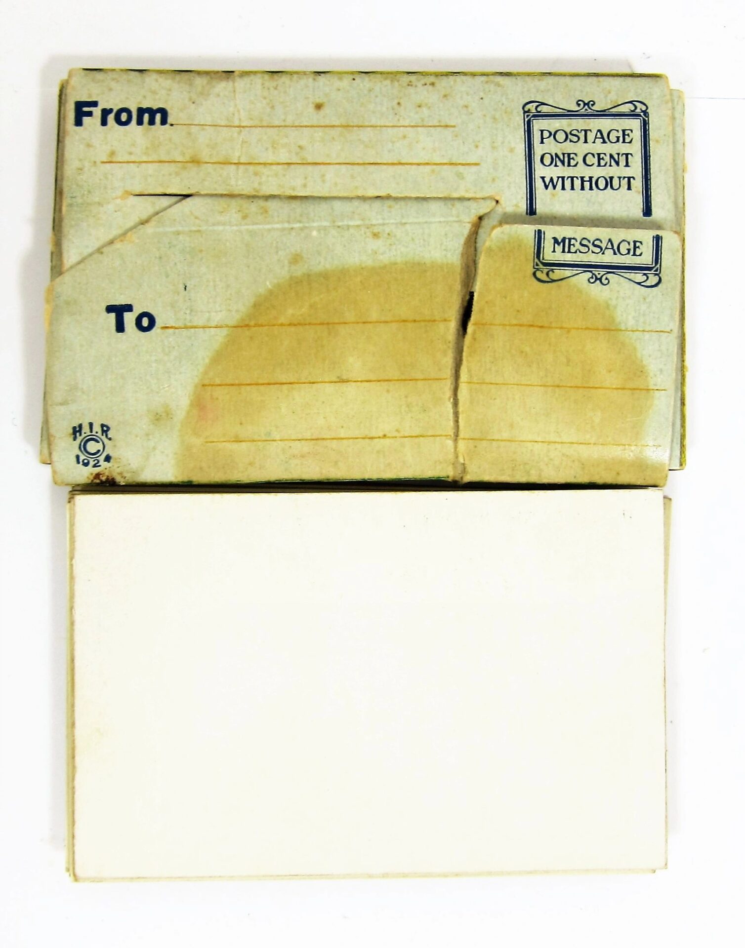An old, partially torn "Gettysburg Souvenir Scenic Photo-Tone Miniatures" postcard with blank "From" and "To" fields, an empty message area, and a note stating one cent postage if sent without a message.
