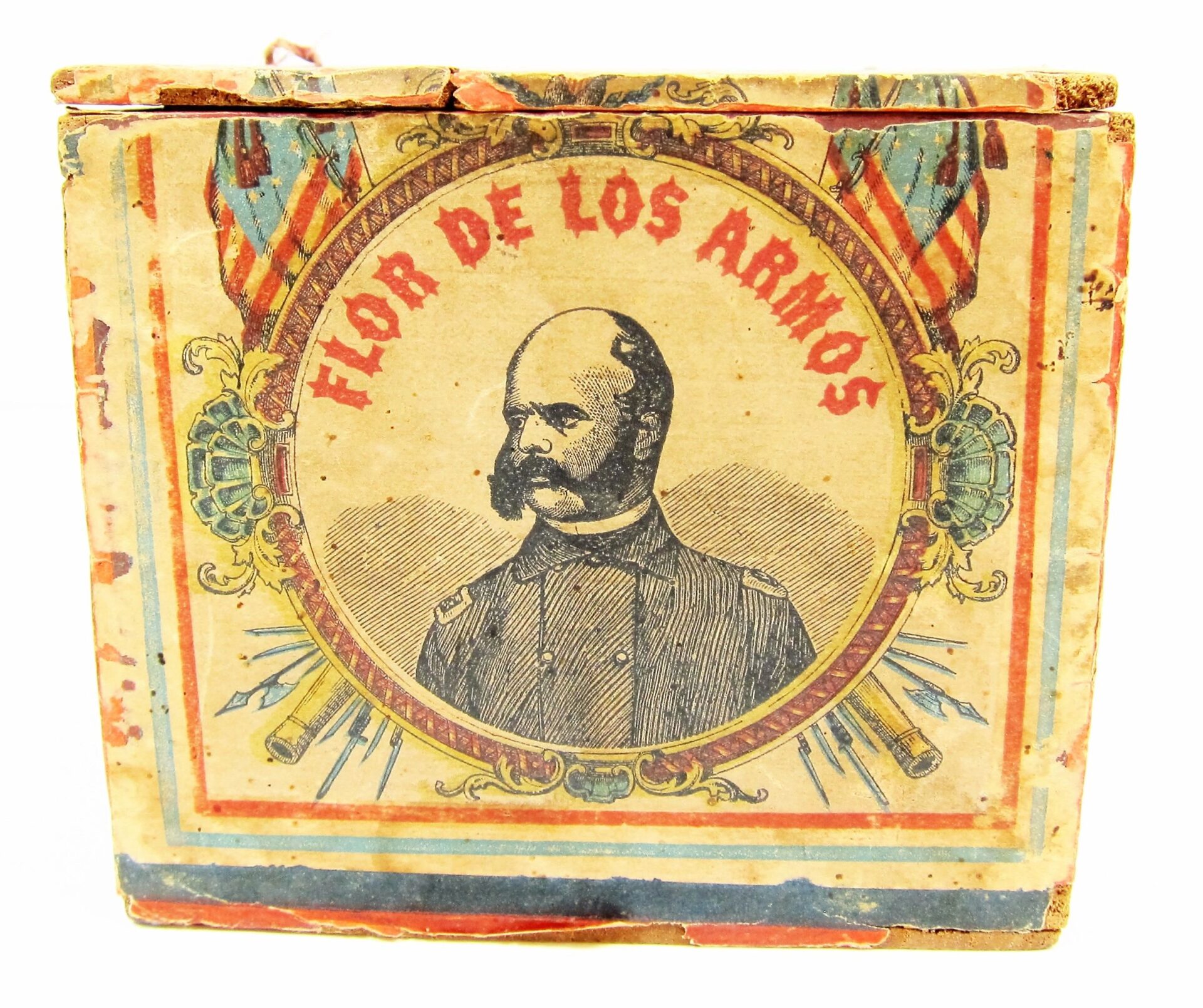 An original Civil War Cuban cigar box, "General Burnside," featuring a uniformed man, "Flor de los Armos" text above him, ornate patterns, and flags. SOLD.
