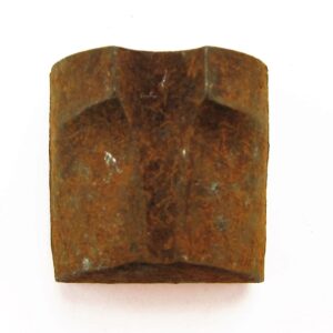 An Unfinished Musket Nose Cap, square-shaped with beveled edges and a central symmetrical groove, is displayed against a white background.