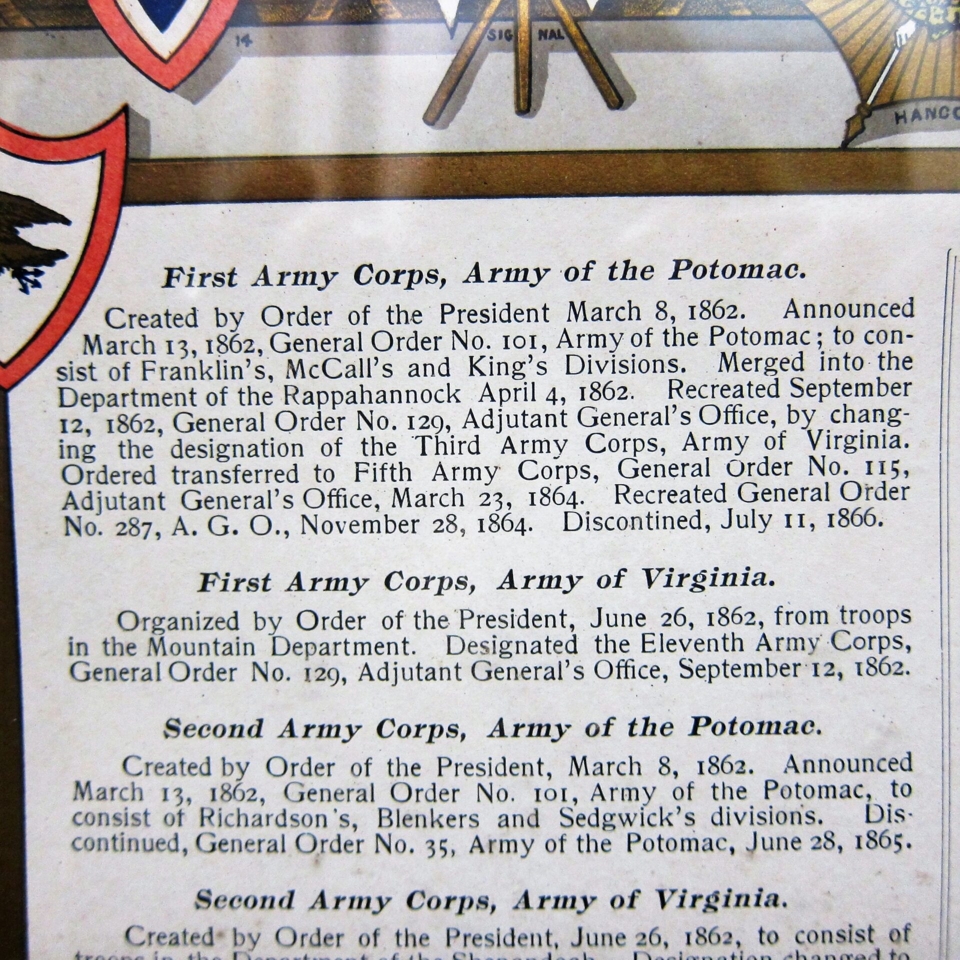 Close-up of the US Army Corp Escutcheon, a historical document detailing the creation and organization of Army Corps in the Army of the Potomac and the Army of Virginia during the Civil War.
