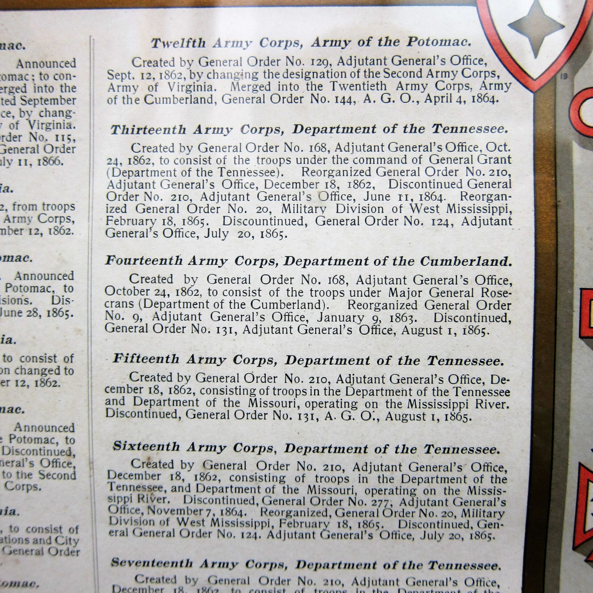 Close-up of the US Army Corp Escutcheon, displaying the histories and organization dates of various Civil War corps: Twelfth, Thirteenth, Fourteenth, Fifteenth, and Sixteenth.