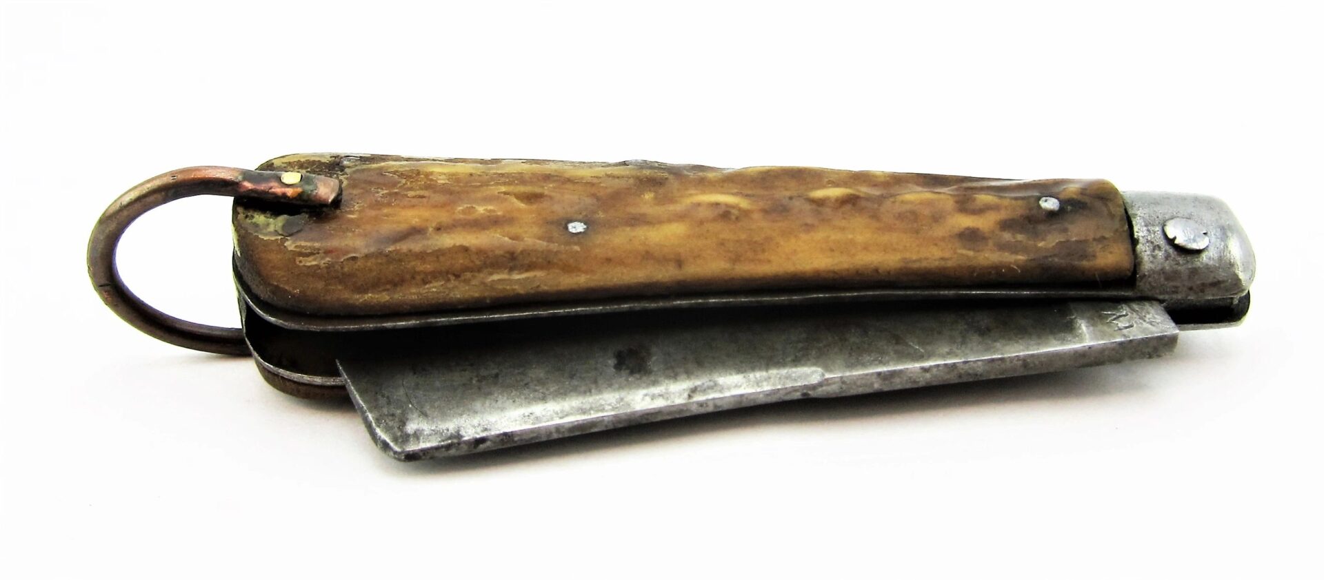 A Rare Civil War Era Navy Sailor's Working Pocket Knife with a brown textured handle and a partially opened blade rests on a white background.