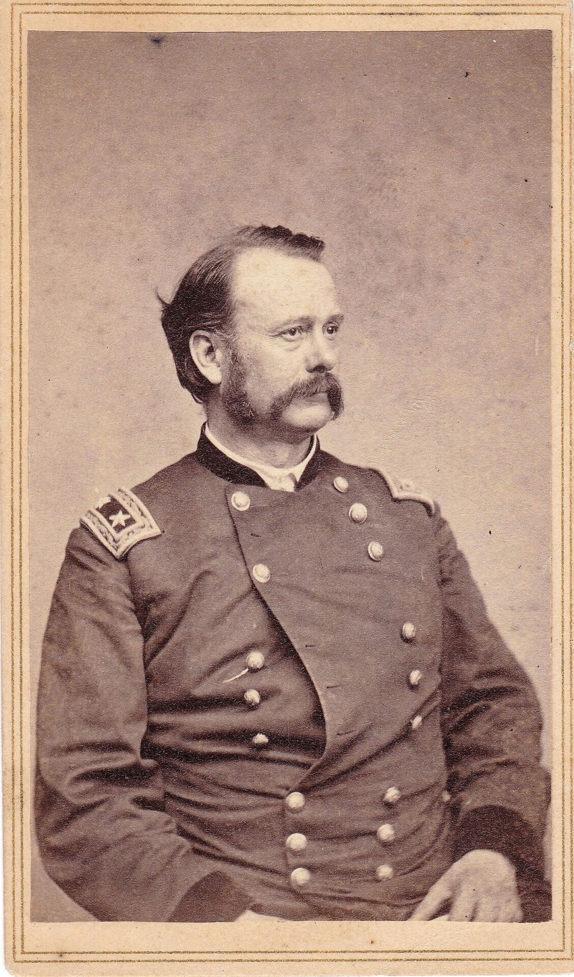 Black-and-white portrait of Major General Lovell Harrison Rousseau in a double-breasted military uniform with shoulder insignia, facing slightly left against a plain background.