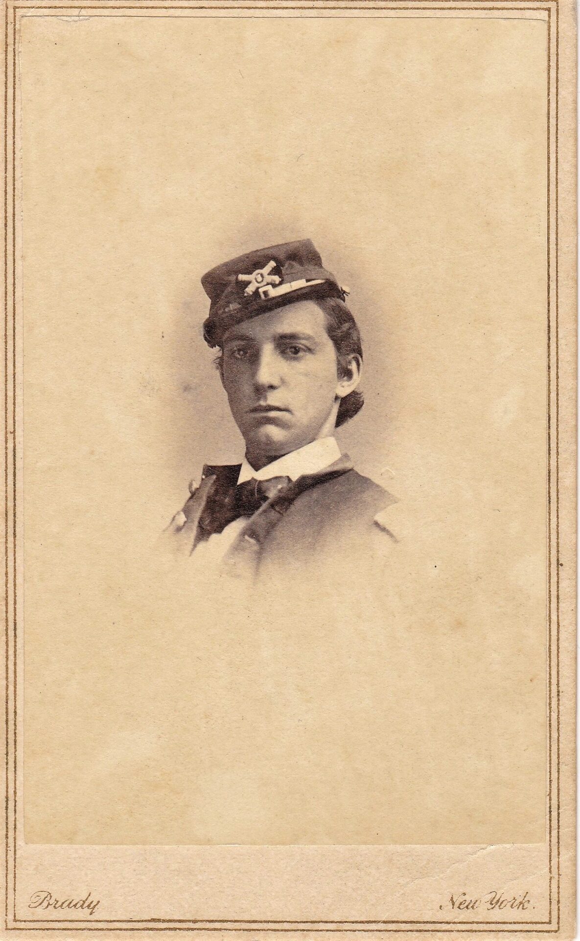 Sepia-toned portrait of William Clarendon Cuyler, US Army 3rd Light Artillery, in uniform and cap, photographed by Brady in New York.