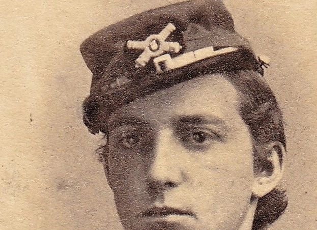 William Clarendon Cuyler, US Army 3rd Light Artillery, in uniform with cap insignia, looks at the camera in this sepia-toned photograph by Brady.