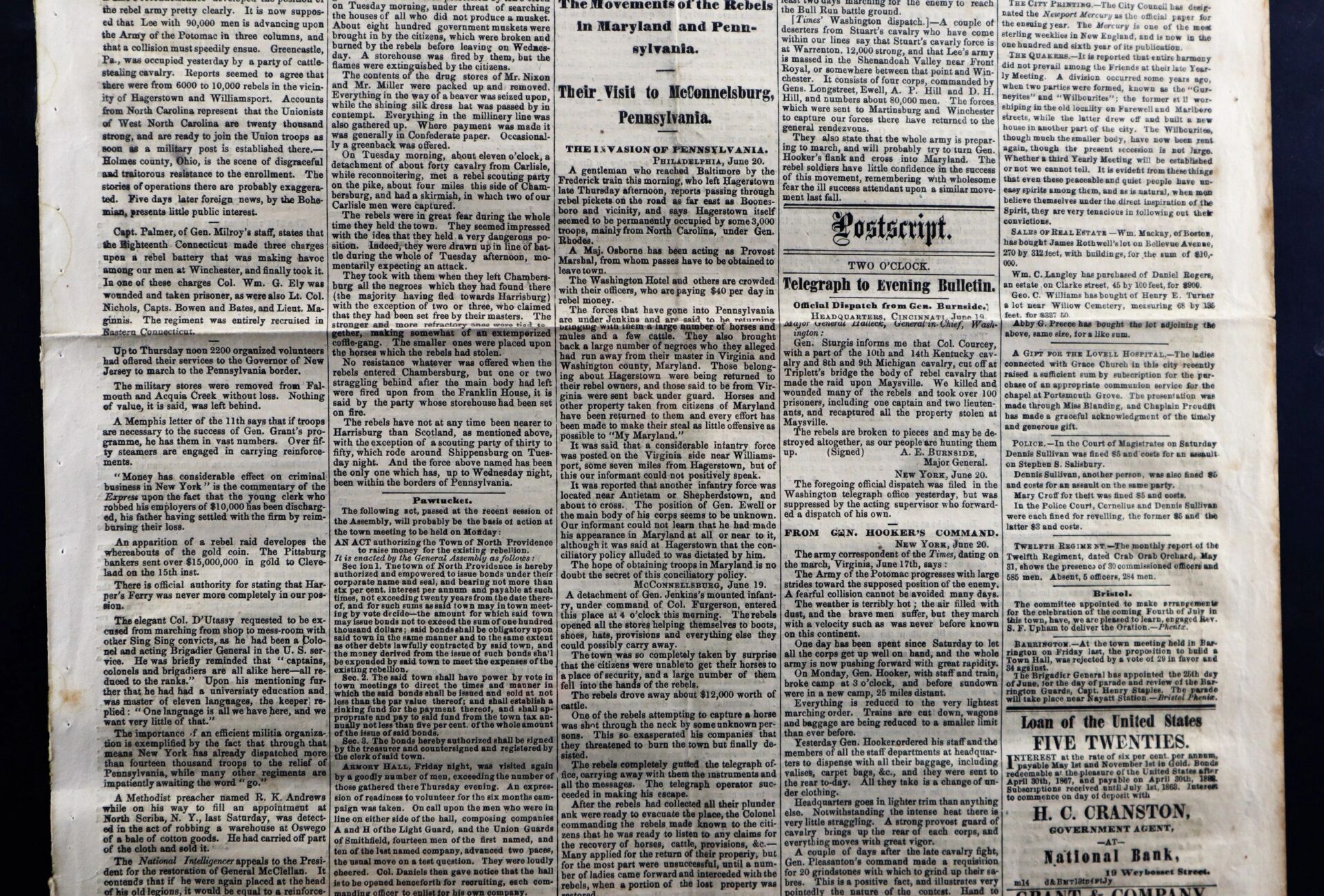 A close-up of the Gettysburg Campaign Newspaper, showcasing dense black and white text columns, headlines, and period advertisements.