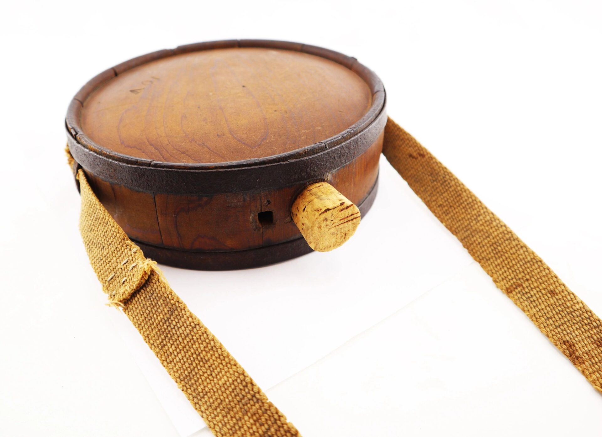 A Confederate Wood Drum Canteen with a cork stopper and two tan fabric straps, photographed against a white background.