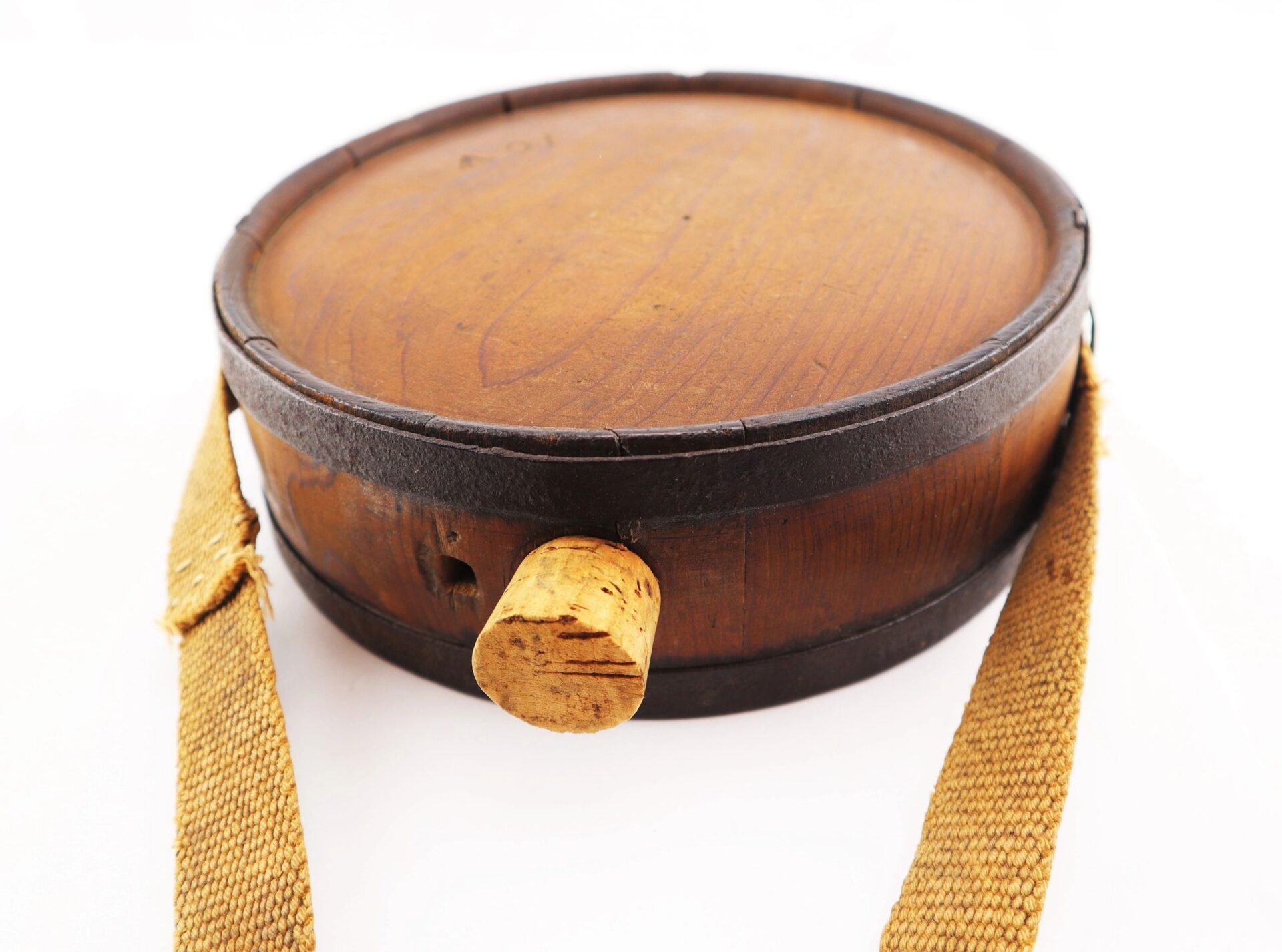 Confederate Wood Drum Canteen / SOLD: A round wooden canteen with a cork stopper, metal rim, and woven shoulder strap is shown against a white background.