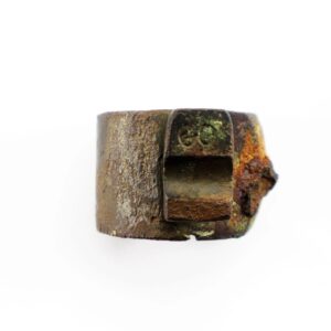 A Confederate Bayonet Adapter, small and metal with rust and corrosion, featuring a rectangular cutout. Photographed on a plain white background.