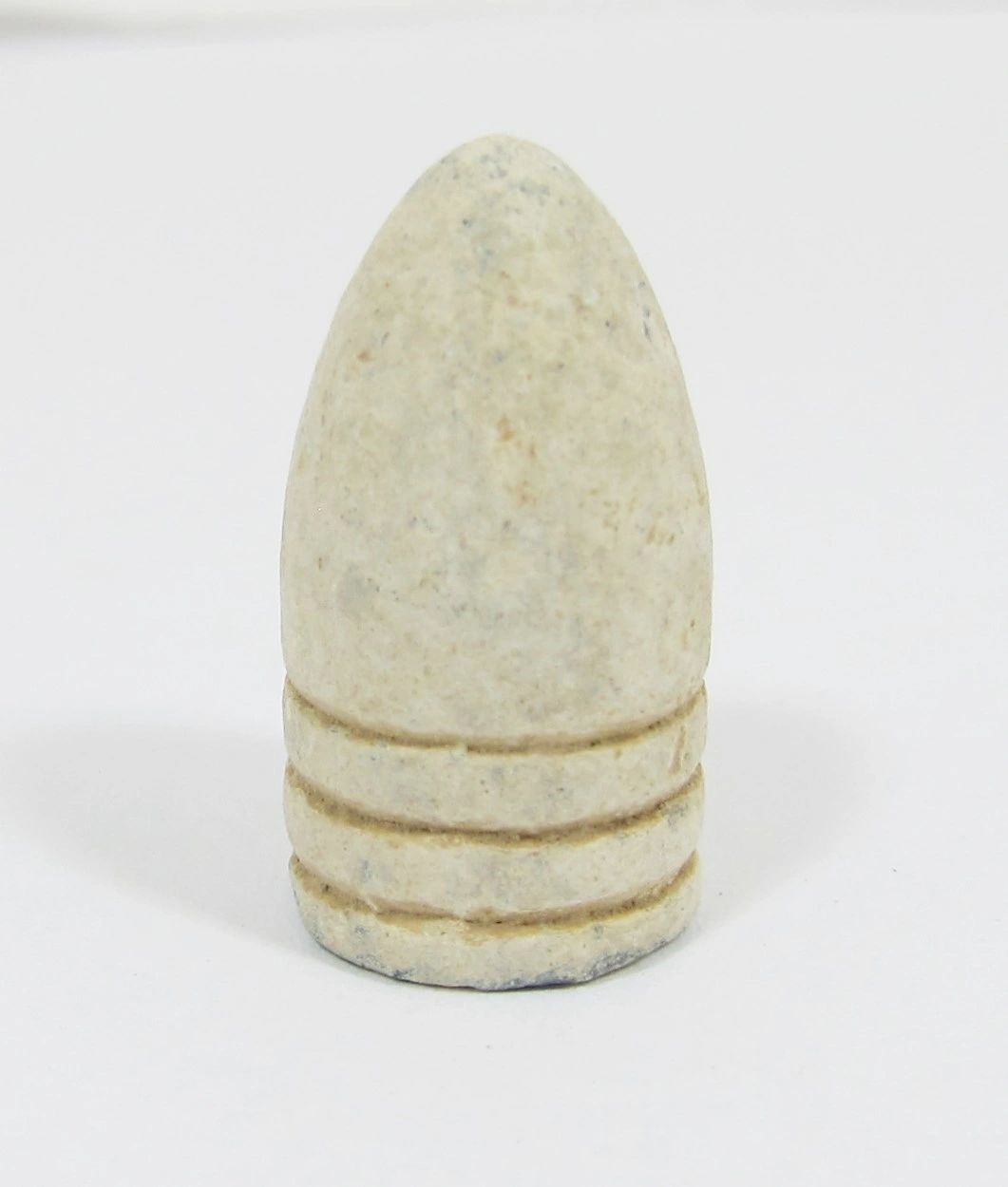 A close-up of a single .58 Caliber 3-Ring Union Bullet from Gettysburg, white and cylindrical with three grooves near its base, standing upright on a plain white background.