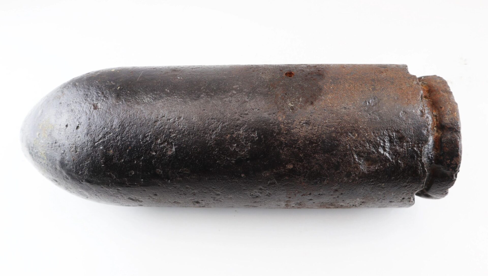 A US 4.2” 30-Pounder Parrott Common Shell, cylindrical with a rounded tip and flat base, is displayed against a white background.