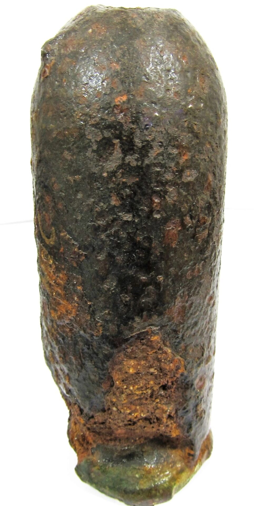 A Confederate Read / Sold cylindrical metal object, resembling an old artillery shell, stands upright against a white background.