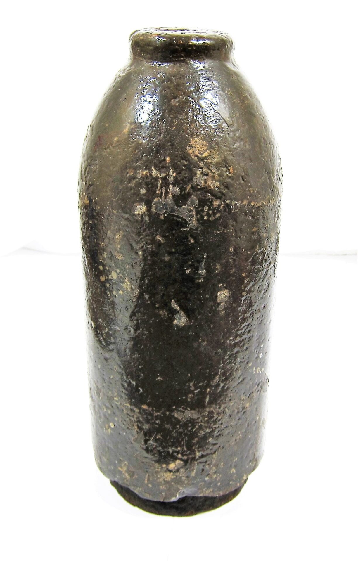 A US 30 Pound Parrott Chilled Nose Bolt is shown upright against a white background, displaying its dark, weathered cylindrical form and narrow neck.