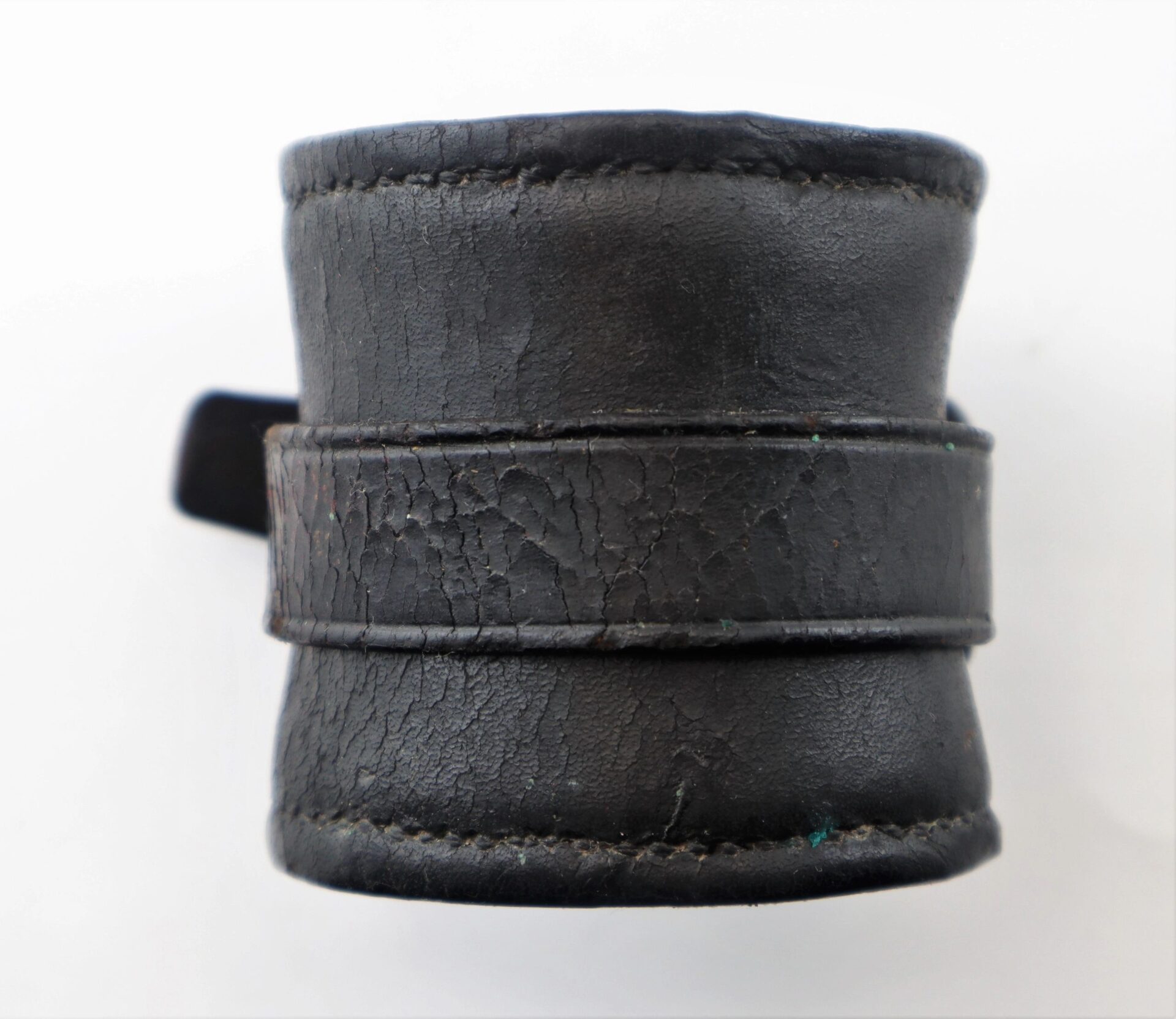 A close-up of the Civil War Cavalry Carbine Boot, showing its worn black leather cuff with visible creases and stitching, displayed against a white background.