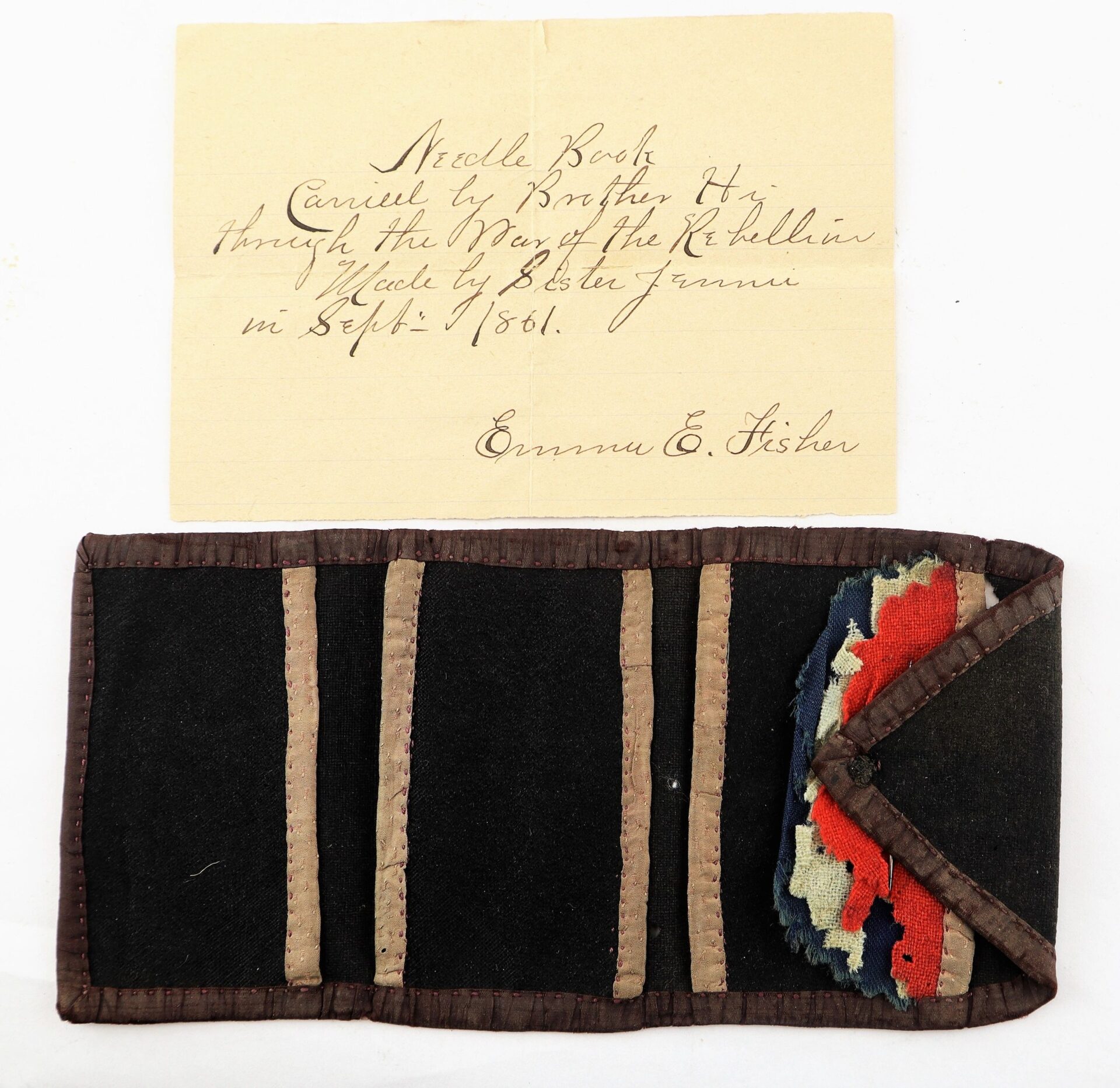 A knife and grouping identified to Hiram T. Fisher, 16th Ohio and 53rd USCT, from the John Hunt Morgan collection, is displayed below a handwritten note detailing its maker and origin.