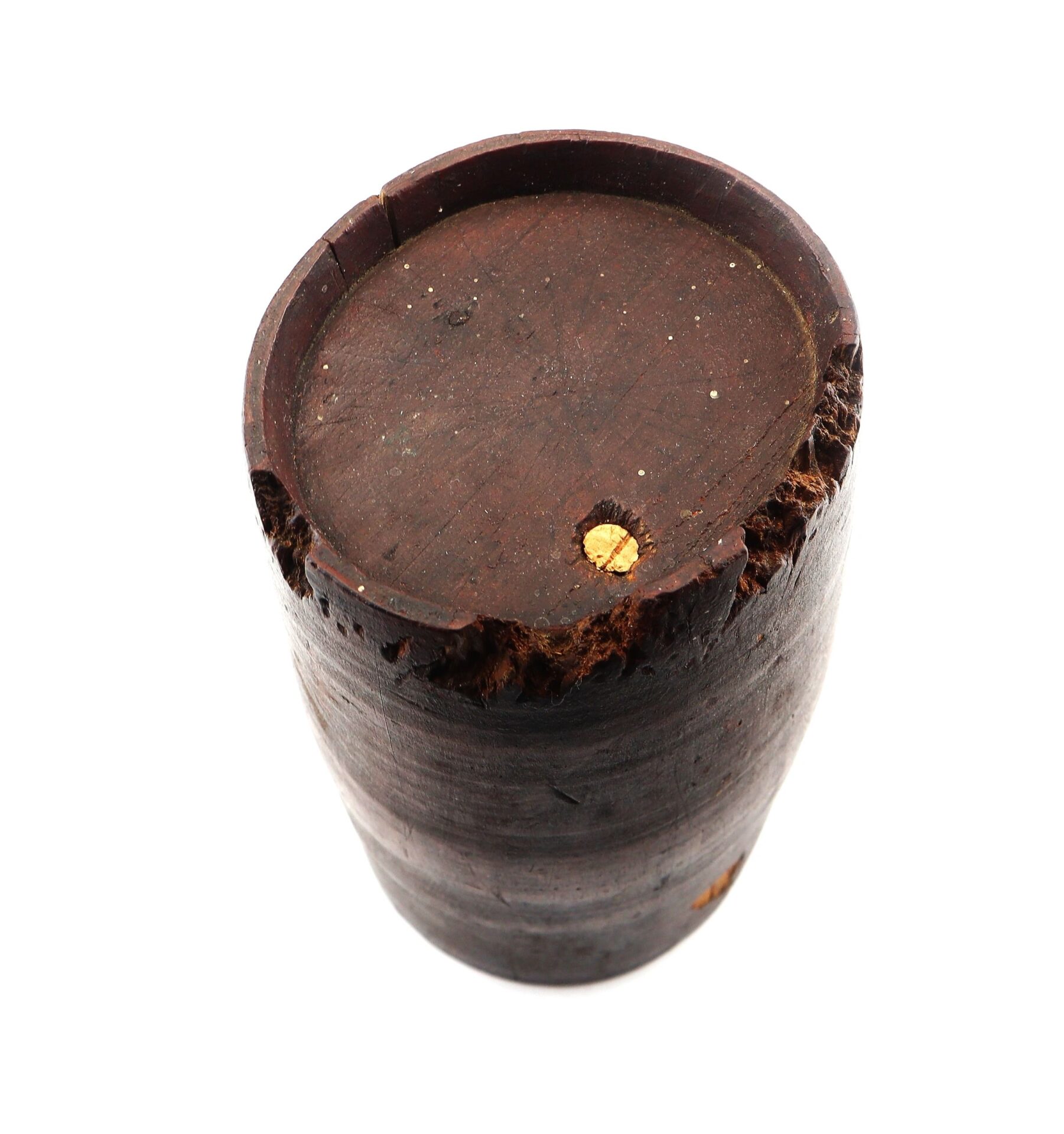 A cylindrical, dark brown War of 1812 Rundlet Canteen with a flat top and worn, chipped edges is displayed against a white background.