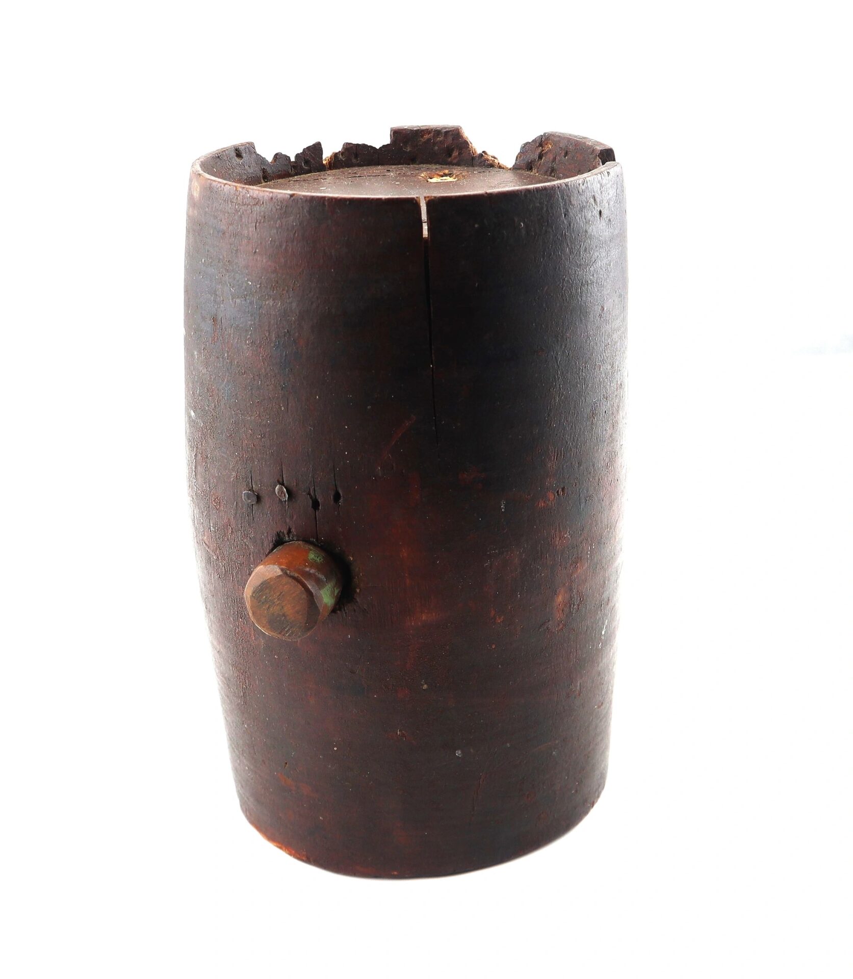 A War of 1812 Rundlet Canteen with a cylindrical, weathered wooden body, metal bolt on the side, and cracked top is displayed against a white background.