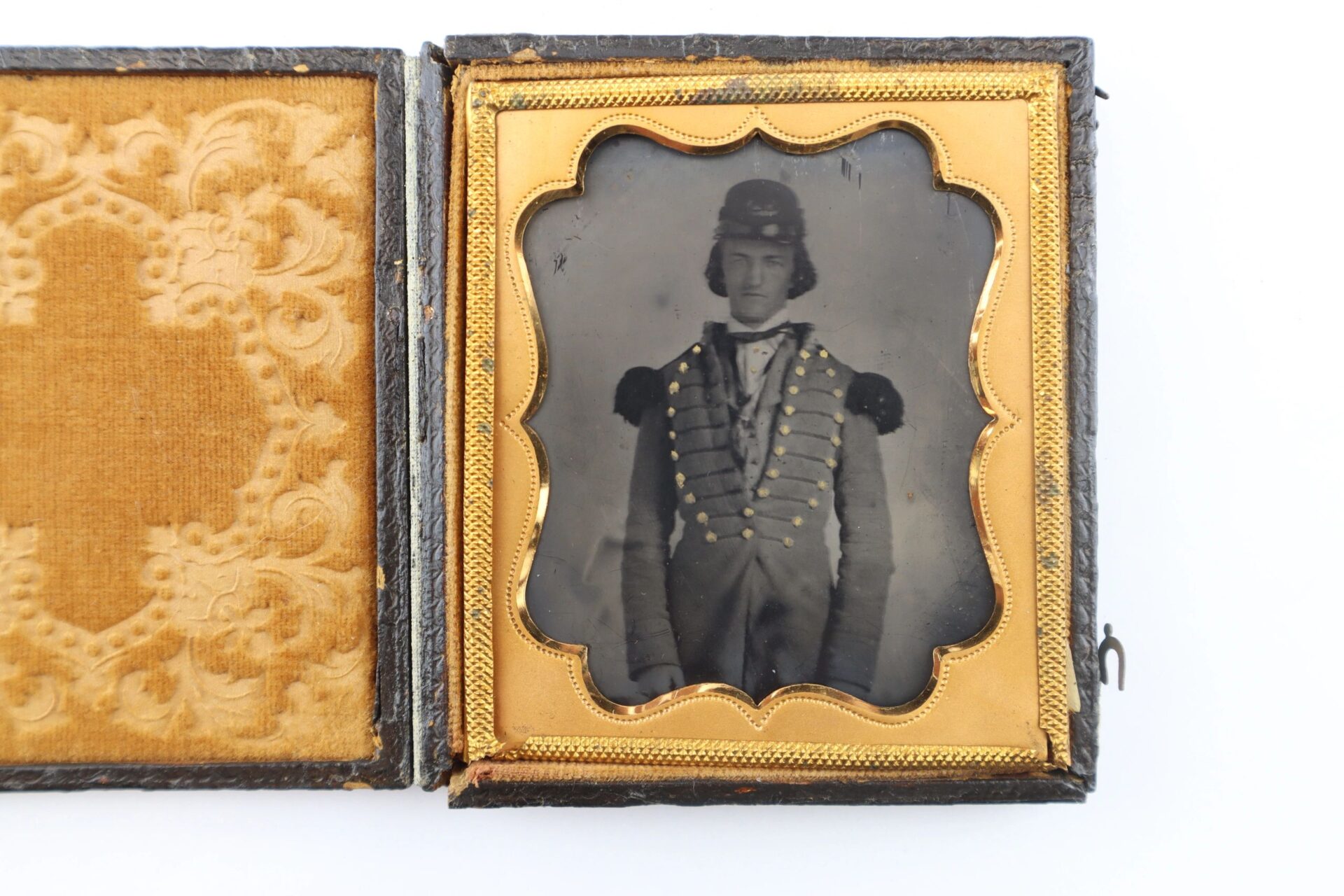 1/6 Plate Ambrotype of a Southern Militiaman in uniform, housed in a decorative case—an antique 19th-century photograph.