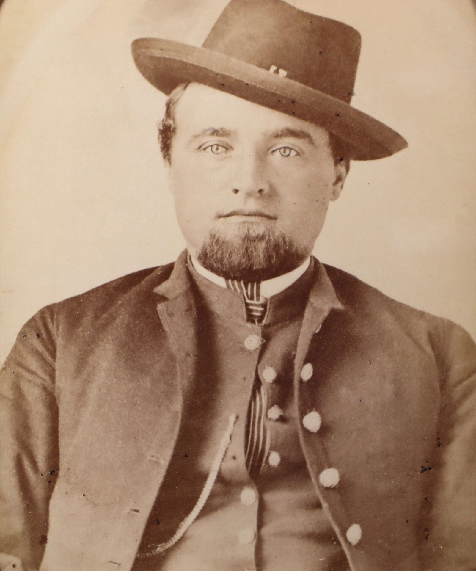 Albumen photograph showing a Western Theater Union soldier with a wide-brimmed hat, buttoned jacket, goatee, and mustache, facing the camera.