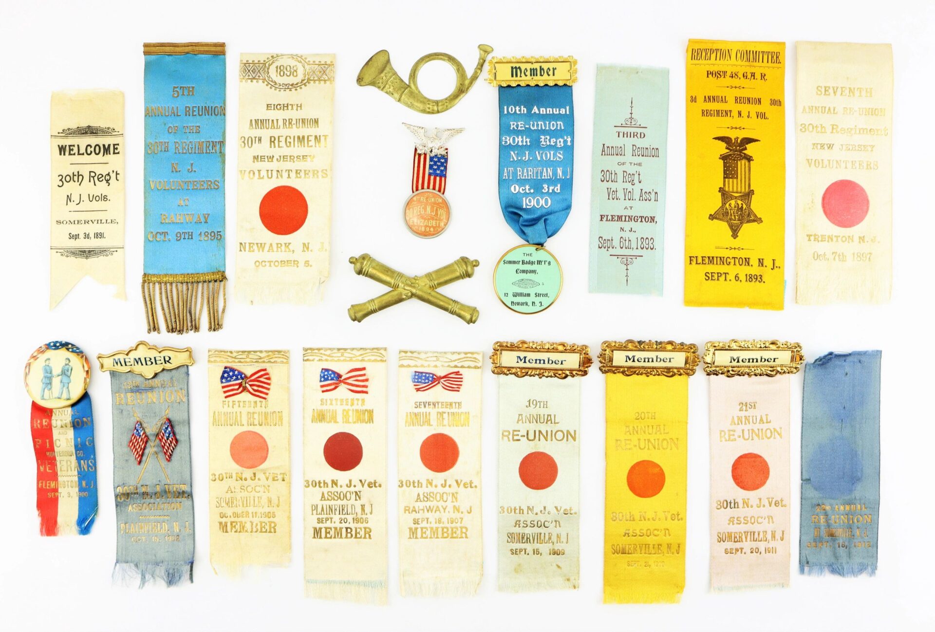 Discharges, Bible, and reunion ribbons of David R. Weaver, 30th New Jersey Infantry & Battery D, 1st NJ Light Artillery displayed on a white background. / SOLD.
