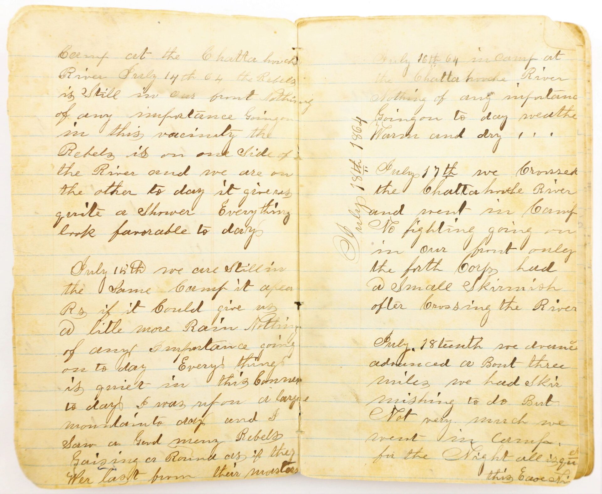 The Atlanta Campaign Diary of John Strawser, 38" Ohio Infantry, is an open, aged handwritten journal with neat cursive entries on yellowed pages describing personal experiences and observations in clear ink.