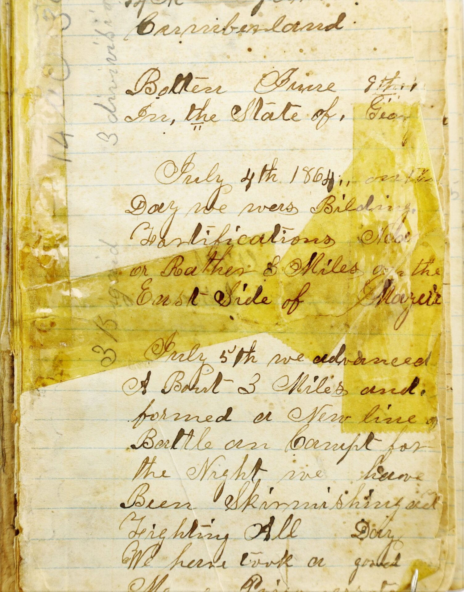 A July 1864 handwritten journal page from the Atlanta Campaign Diary of John Strawser, 38th Ohio Infantry, documents military movements and fortifications on aged paper with yellowed tape repairs.