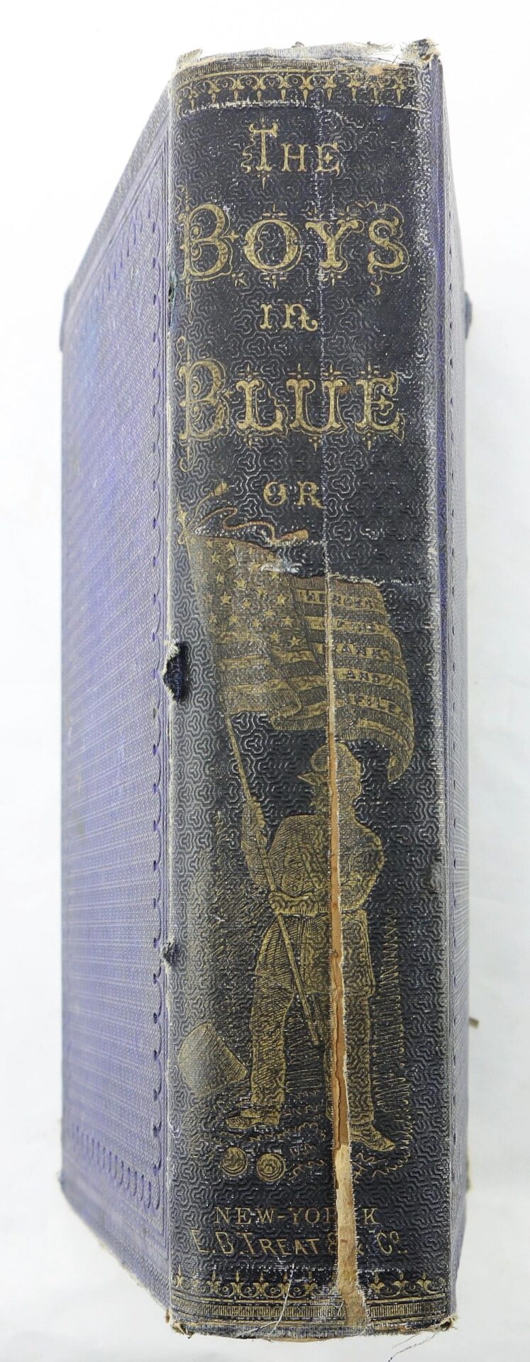 A worn blue hardcover copy of "The Boys in Blue by A. H. Hoge" (SOLD) with a gold soldier holding a U.S. flag illustrated on the spine.