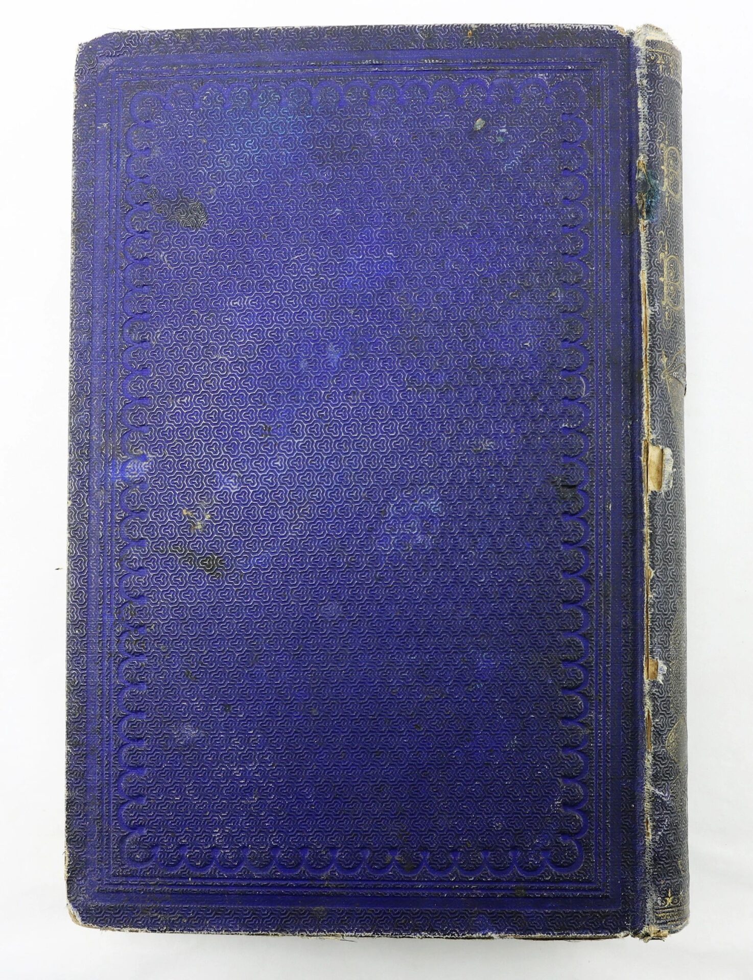 A worn, dark blue hardcover of "The Boys in Blue" by A. H. Hoge with an embossed geometric border on the front cover and aged, frayed edges.