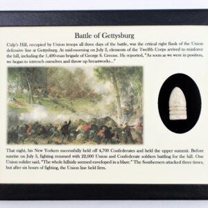 Framed display of an original bullet recovered from Gettysburg Culp’s Hill, with a brief history of the battle and an illustration of soldiers in combat.