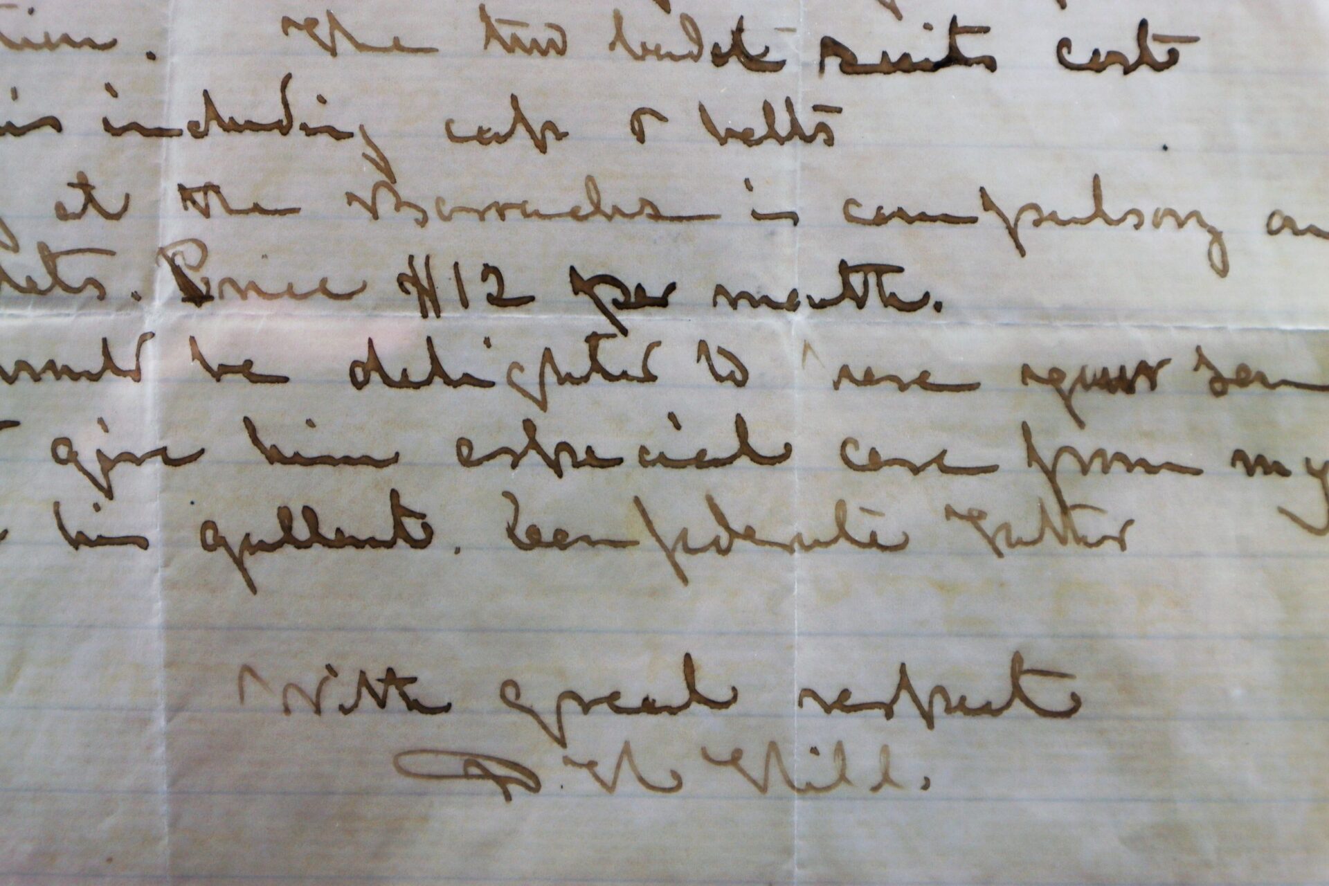 Close-up of a handwritten letter on lined paper in brown ink, featuring cursive writing and the signature of Confederate General D. H. Hill at the bottom right.