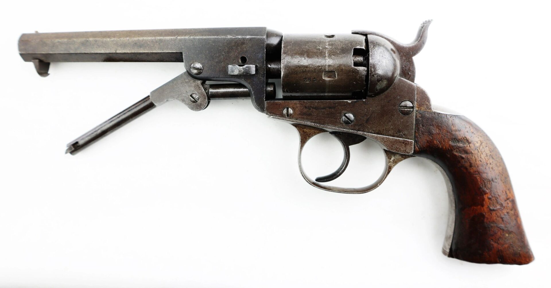 The J. M. Cooper Pocket Model Revolver, featuring a metal barrel, cylinder, and a wooden grip, is displayed on a white background. / SOLD.