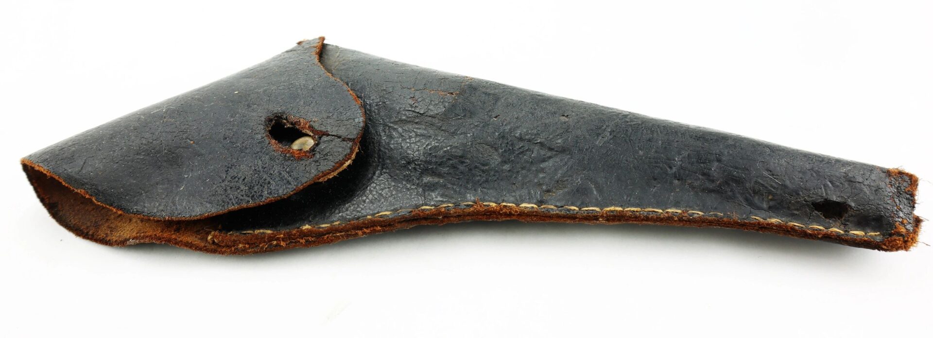 A worn Confederate Holster made of black leather with visible stitching and two small holes—one by the opening, one at the tip—displayed against a white background.