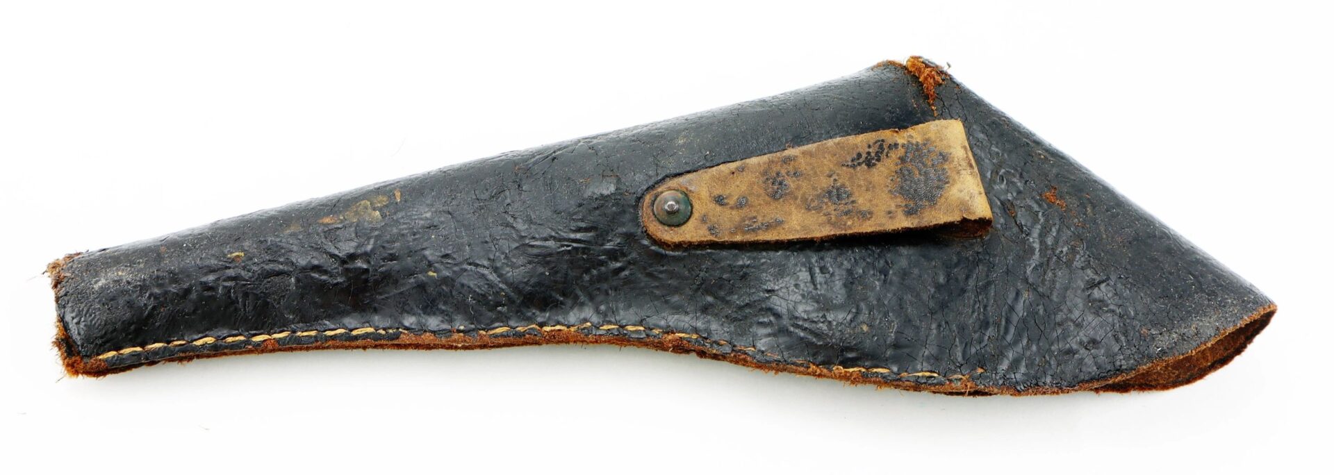 A worn black leather Confederate Holster with visible stitching and a tan leather strap secured by a metal rivet.
