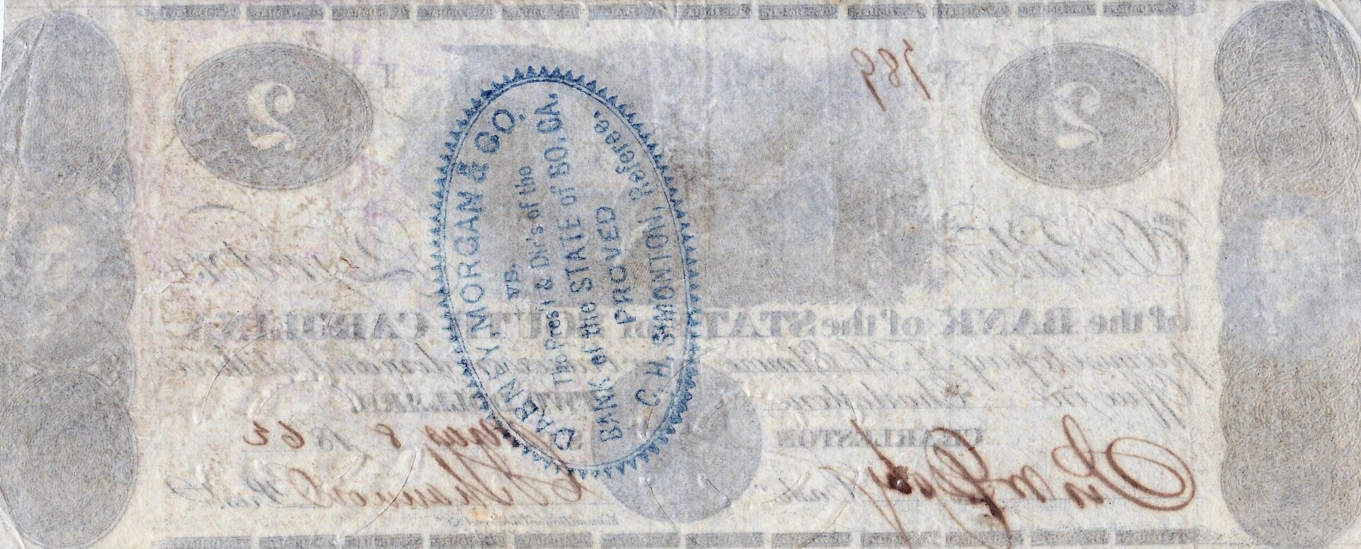 The Bank of the State of South Carolina Two Dollar Note is worn and faded, featuring an oval blue "WM. F. MORGAN & CO. BANKERS, STOCKTON" stamp, red handwritten markings, and the number "2" at both ends.