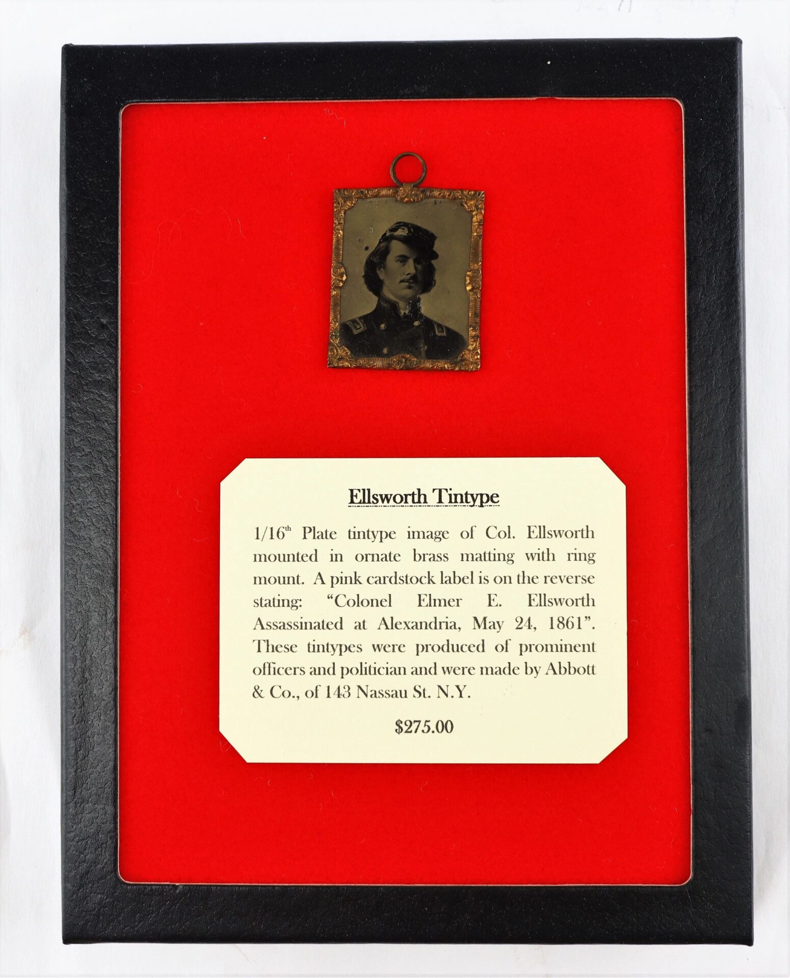 A framed tintype portrait labeled "Ellsworth Tintype / SOLD" is displayed on a red background, accompanied by an informational card identifying the subject as Col. Ellsworth and noting it has been sold.