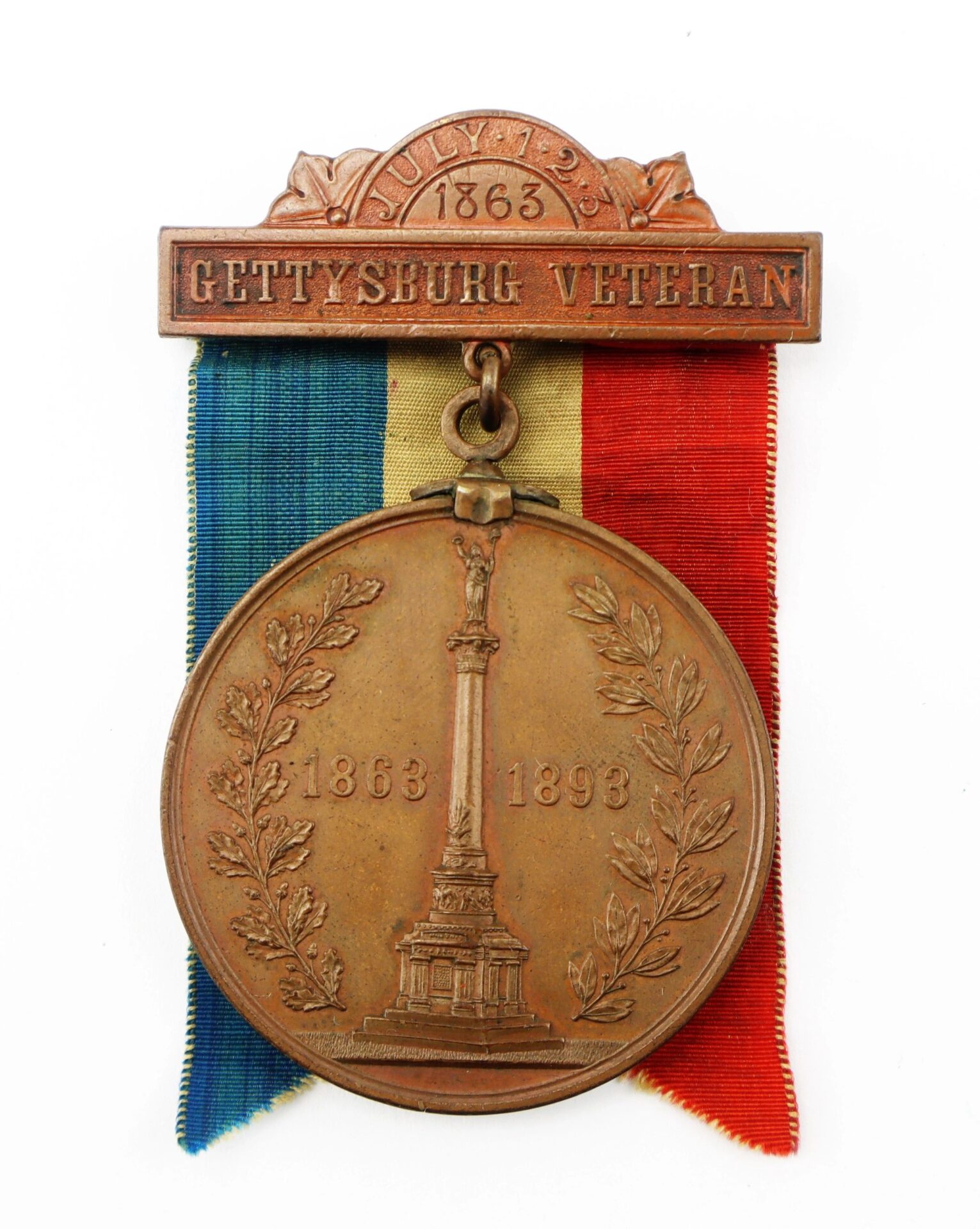 A bronze Gettysburg New York Day Medal inscribed to Private Hugh McDonald, 40th NY Infantry “Mozart Regiment,” with red, white, and blue ribbon, monument and laurel branches, and dates "July 2-3 1863" and "1863 1893.