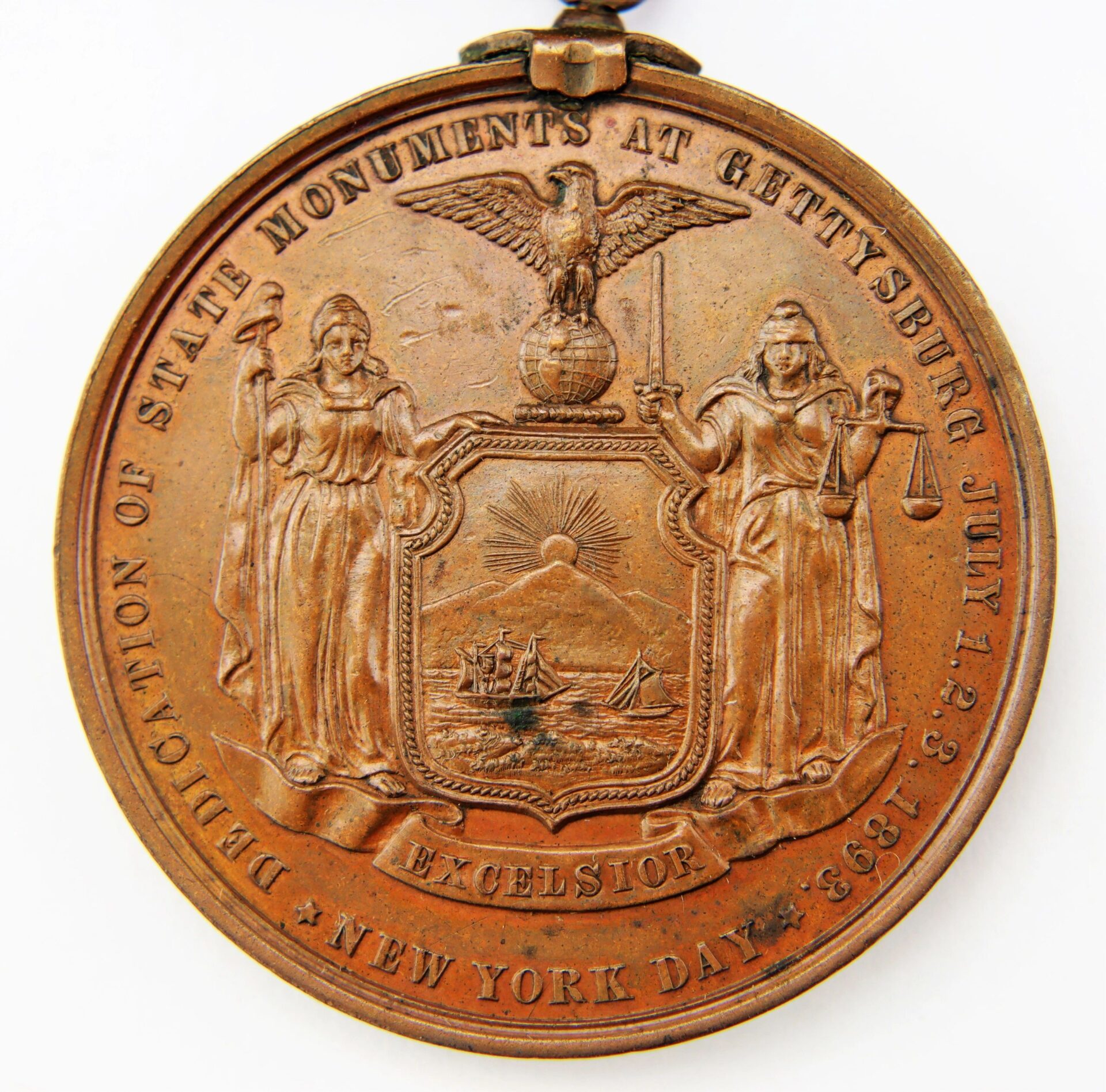 Bronze medallion: Gettysburg New York Day Medal inscribed to Private Hugh McDonald, 40th New York Infantry “Mozart Regiment”, featuring state seal and commemorating the dedication of state monuments at Gettysburg, July 1-3, 1893.
