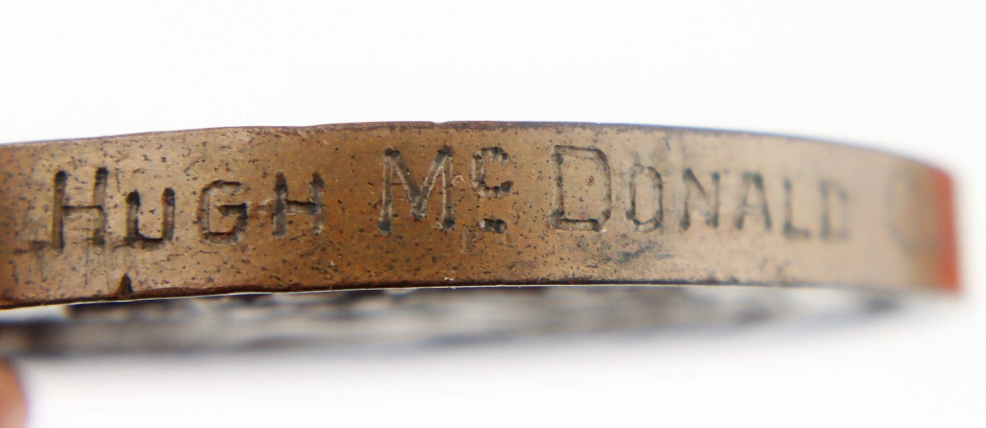 Close-up of the Gettysburg New York Day Medal inscribed to Private Hugh McDonald, 40th New York Infantry “Mozart Regiment.”.