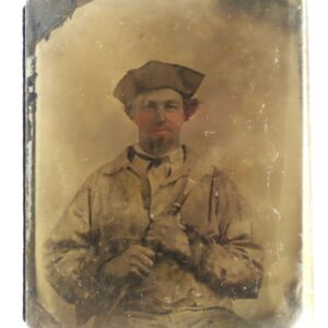 Sepia-toned photo of a Confederate soldier in period attire and hat, holding a piccolo and looking straight at the camera.