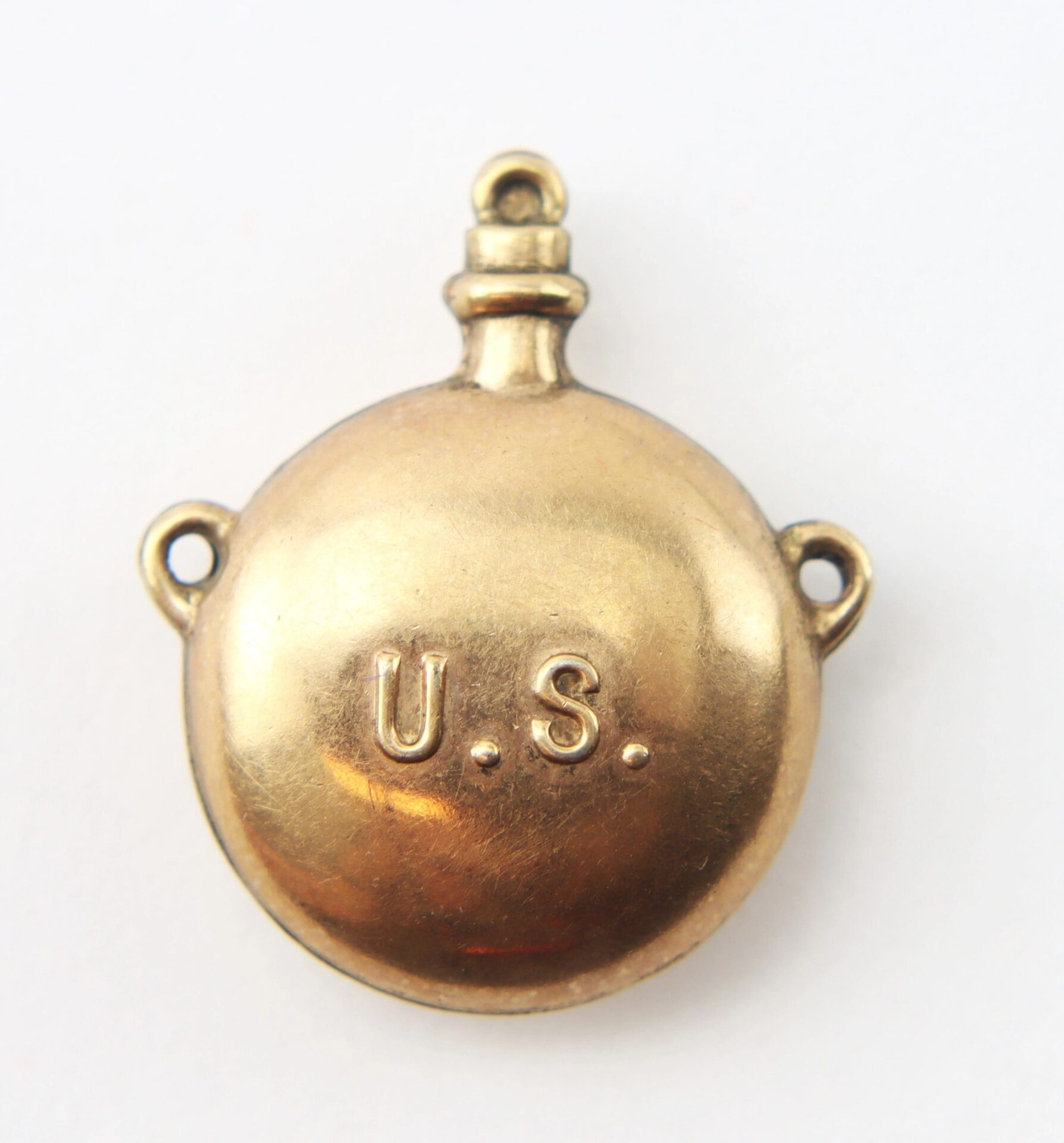 The Gettysburg Souvenir Canteen is a round brass item with "U.S." embossed on the front and two small side loops, shown against a white background.