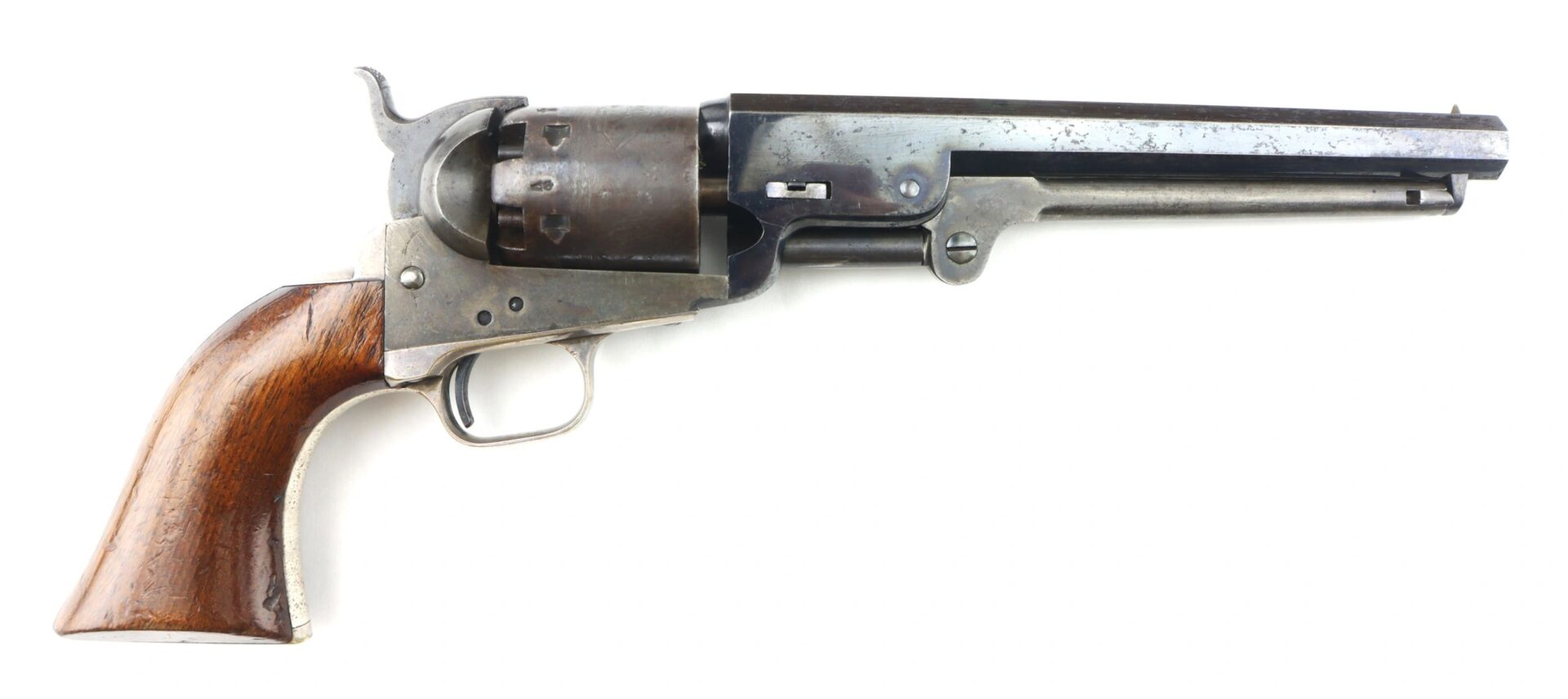 A Cased High Condition London Colt 1851 Navy Percussion Revolver with a wooden grip, metal frame, and octagonal barrel is displayed on a white background.
