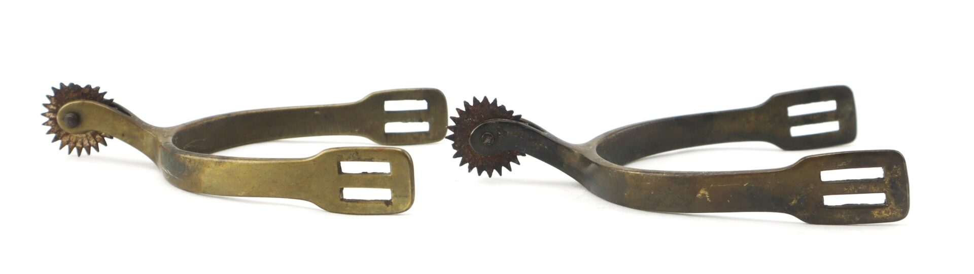 Two Civil War Spurs with rowels are positioned side by side on a white background.
