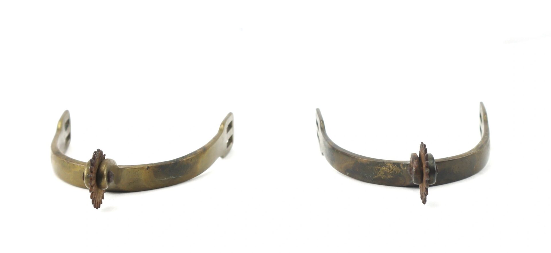 A pair of Civil War Spurs with small rowels are displayed side by side on a white background.