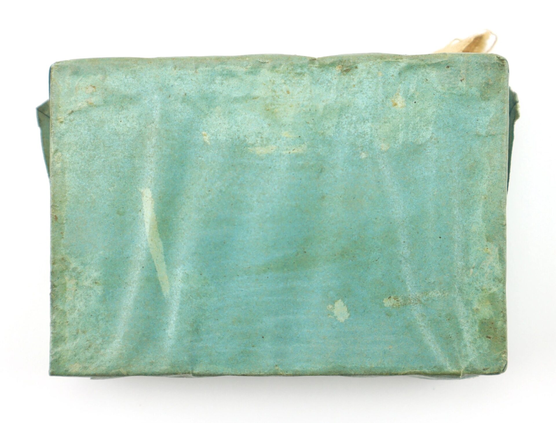 A rectangular, weathered Frankford Arsenal 12 Second Fuses box in light blue-green, with a slightly wrinkled and worn surface, photographed against a white background.