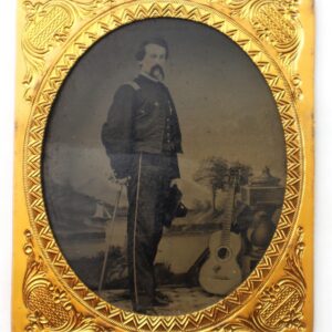 A vintage black-and-white portrait titled "5th Corps Captain with Guitar!" shows a man in formal attire standing beside a guitar, all framed in an ornate gold oval frame.