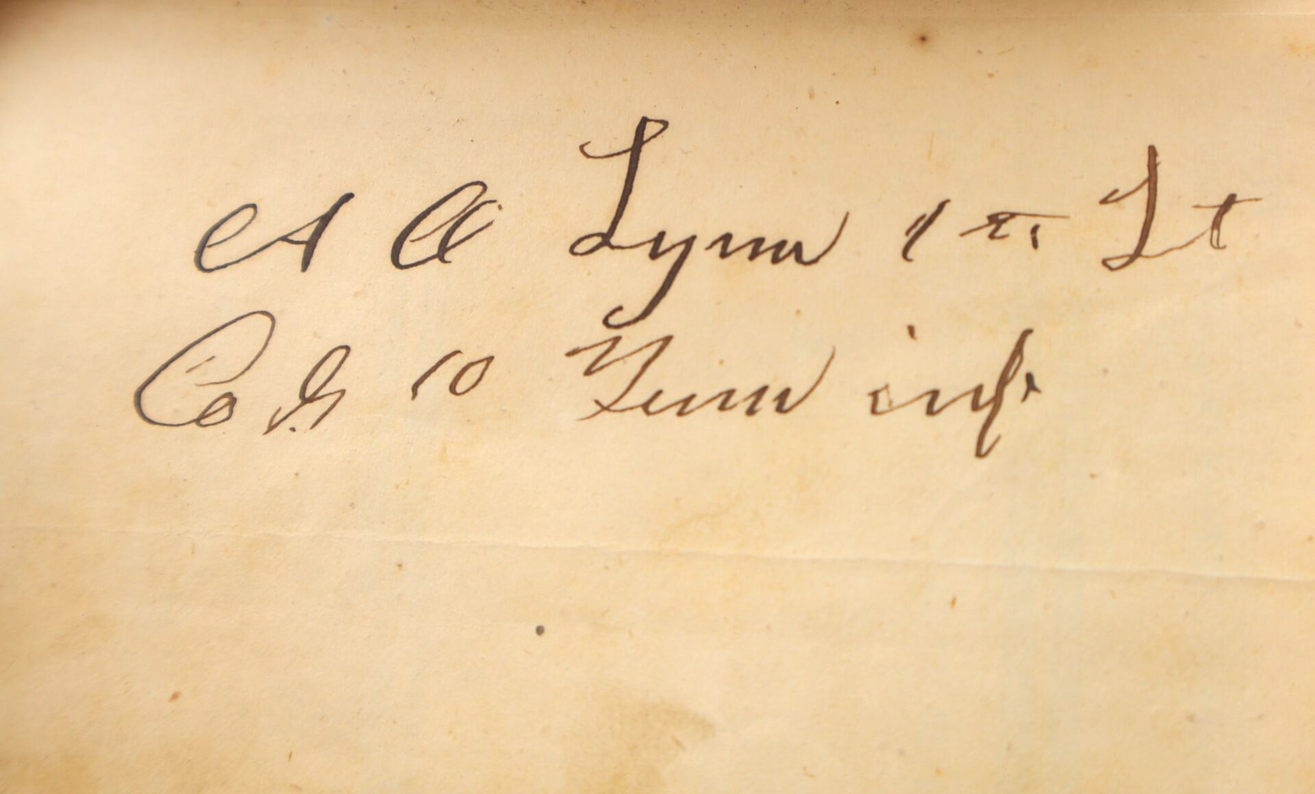 Aged paper with handwritten cursive text reads: "A. A. Lynn 1st Lt. Co. G 10 Tenn Inf."—a distinctive artifact from the 10th Tennessee Volunteer Infantry (Union) Grouping.