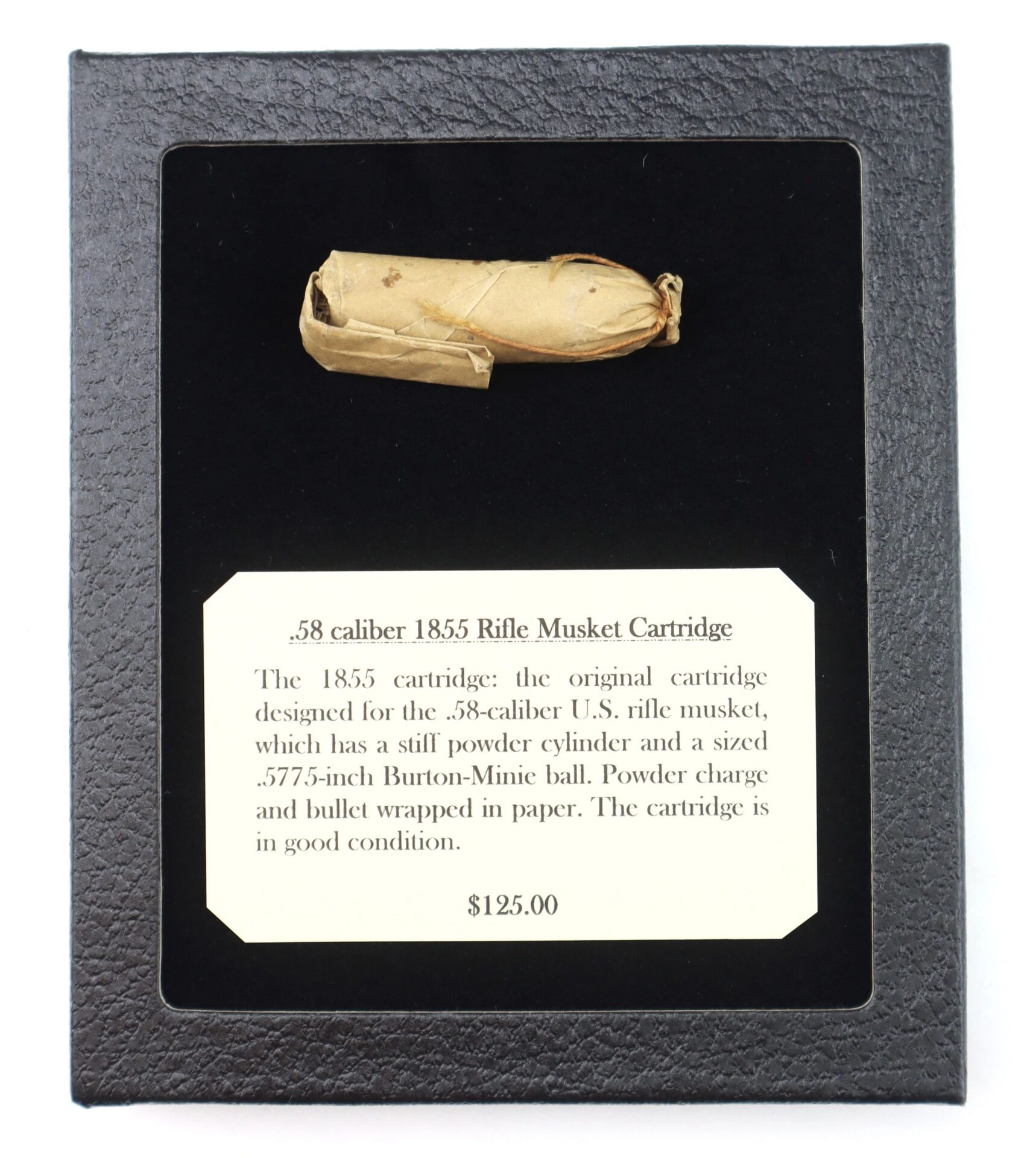 A .58 caliber 1855 Rifle Musket Cartridge wrapped in paper is shown above a label describing the item and listing its $125 price.