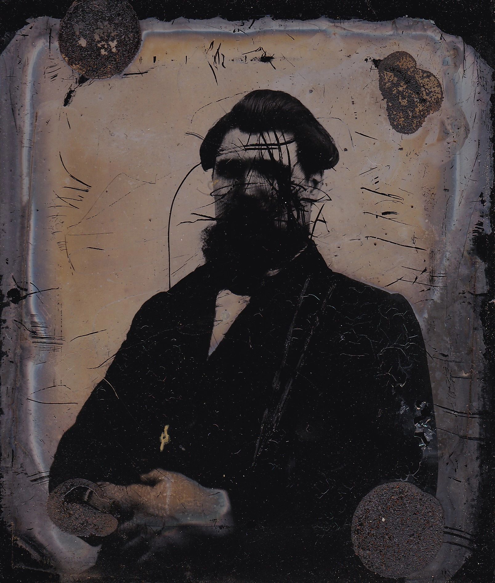 A scratched and damaged antique sixth plate tintype of an infantry officer with a beard and dark suit, facing the camera and holding a musket against a plain background. Product name: Infantry Officer Holding Musket Sixth Plate Tintype.